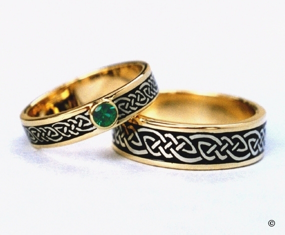 Celtic Bonding Knot Rings, 15K Yellow Gold Bands with White Gold Knots and a bezel set.25ct Emerald